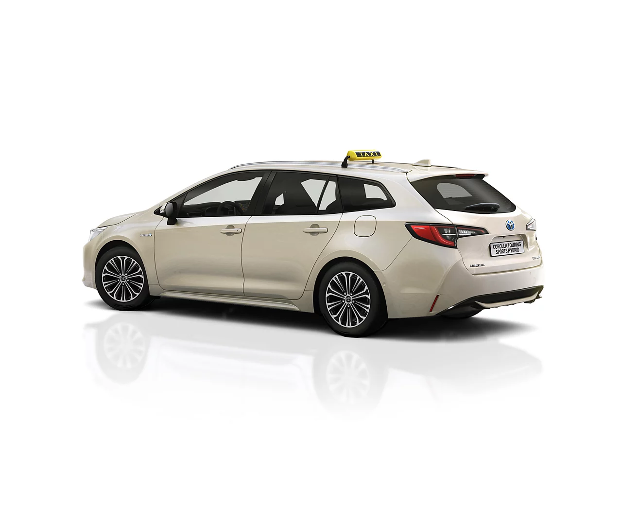 Beiger Corolla Touring Sports mit Taxi-Schild